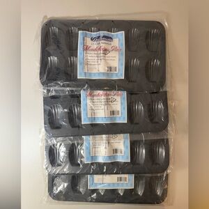 Wilton Nonstick Madeleine Pan - Black set of 4 for $50.00 never OPENED